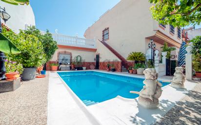 Exterior view of Flat for sale in La Rinconada  with Air Conditioner, Swimming Pool and Furnished