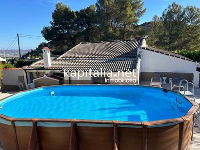 Swimming pool of House or chalet for sale in Albaida  with Air Conditioner, Heating and Storage room
