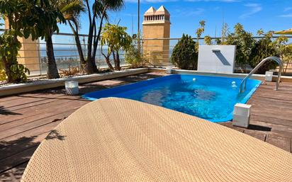 Swimming pool of Attic for sale in Marbella  with Air Conditioner, Terrace and Storage room