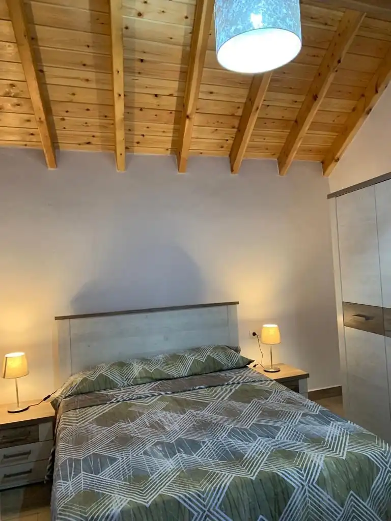 Dormitori de Casa adosada en venda en Guía de Isora amb Jardí privat i Terrassa