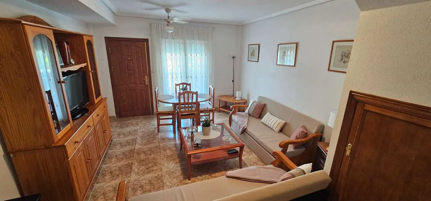 Sala de estar de Dúplex en venta en Orihuela con Terraza, Piscina y Amueblado
