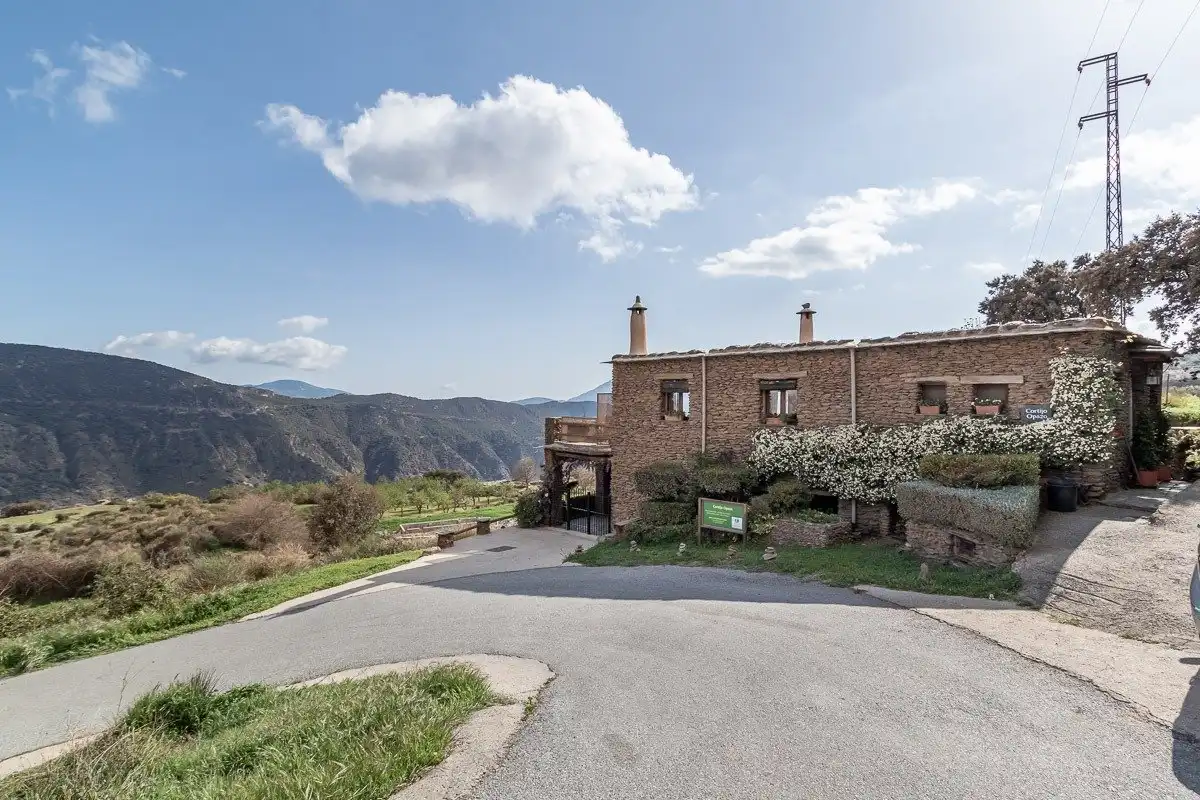 Vista exterior de Casa o xalet en venda en Pórtugos amb Calefacció, Jardí privat i Terrassa