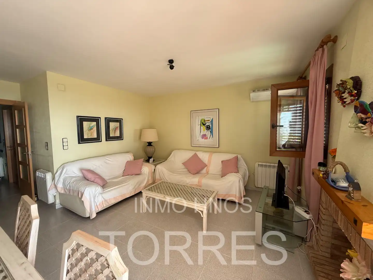 Sala de estar de Casa adosada en venta en Benicarló con Aire acondicionado, Jardín privado y Terraza