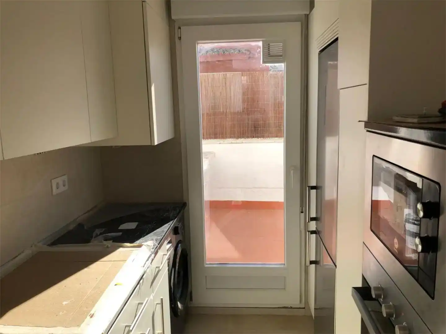 Küche von Dachboden zur Miete in  Madrid Capital mit Balkon