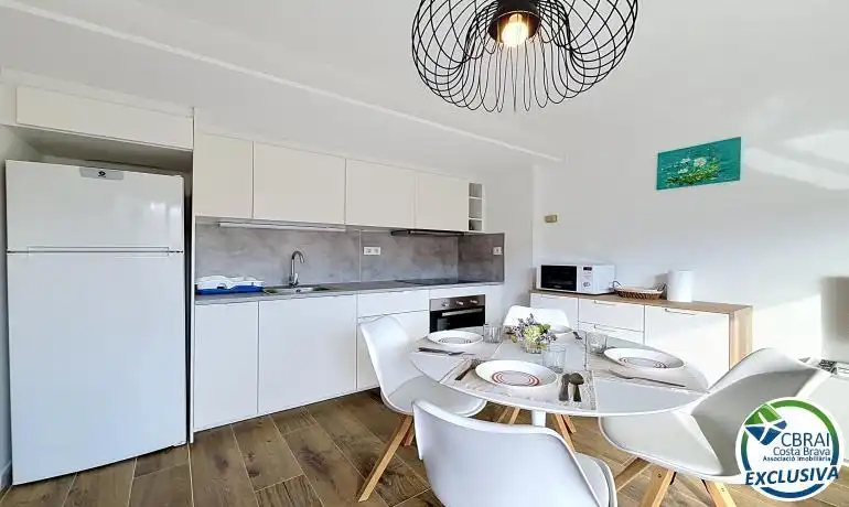 Kitchen of Flat for sale in Roses  with Heating, Terrace and Furnished