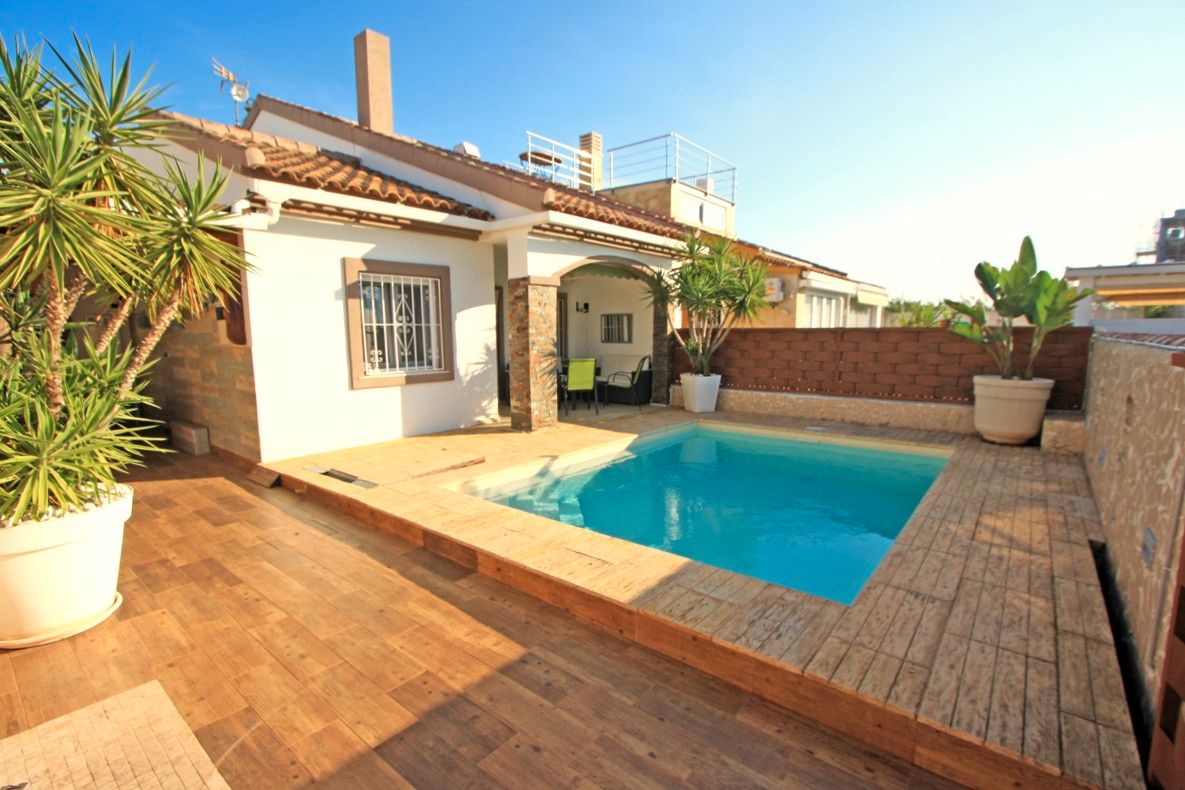 Swimming pool of Single-family semi-detached for sale in Dénia  with Air Conditioner, Terrace and Swimming Pool