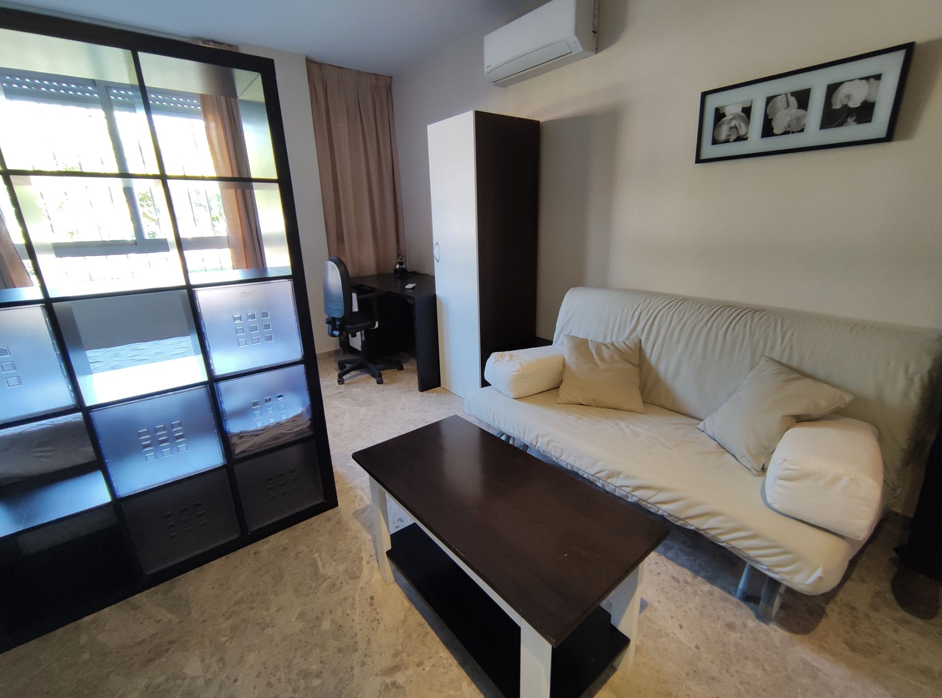 Dormitori de Apartament de lloguer en Ciudad Real Capital amb Aire condicionat i Moblat