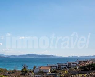 Vista exterior de Casa o xalet en venda en Sanxenxo amb Jardí privat, Parquet i Terrassa