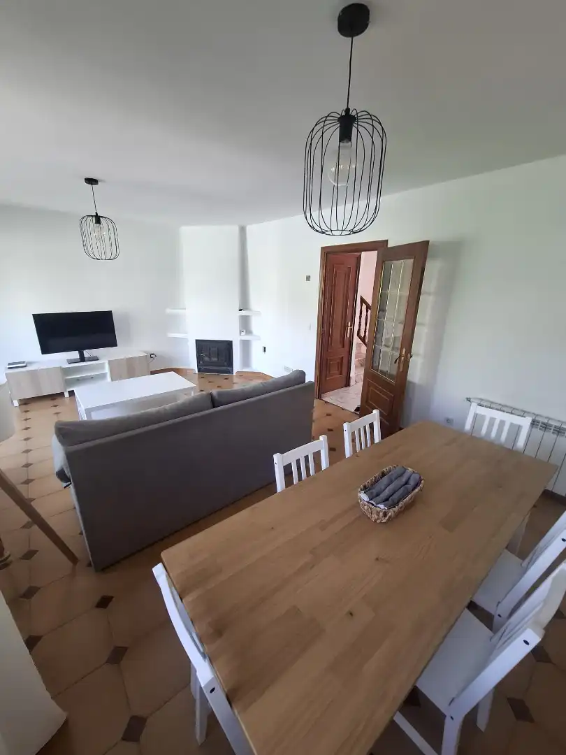 Sala d'estar de Casa adosada en venda en Villaviciosa de Odón amb Aire condicionat, Calefacció i Jardí privat