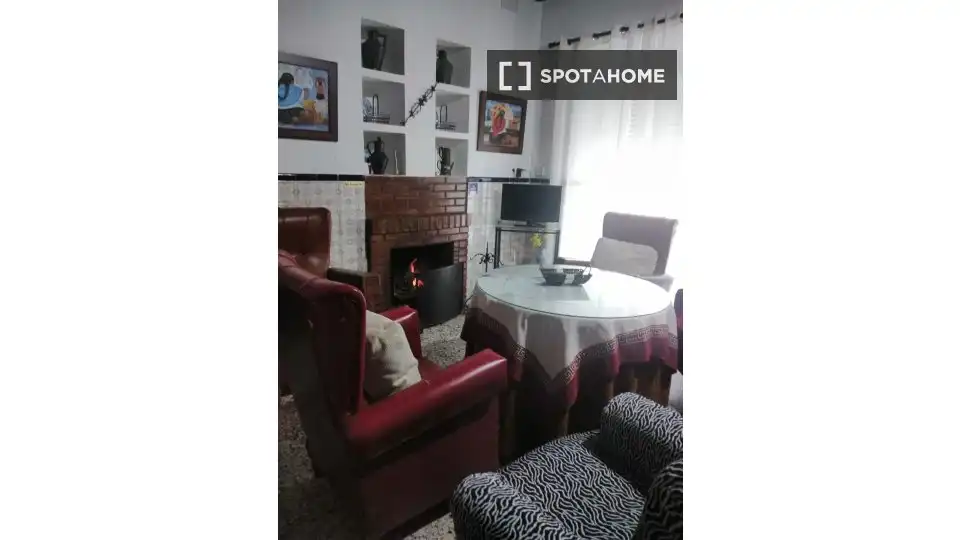 Sala d'estar de Apartament per a compartir en Encinasola amb Aire condicionat, Terrassa i Moblat