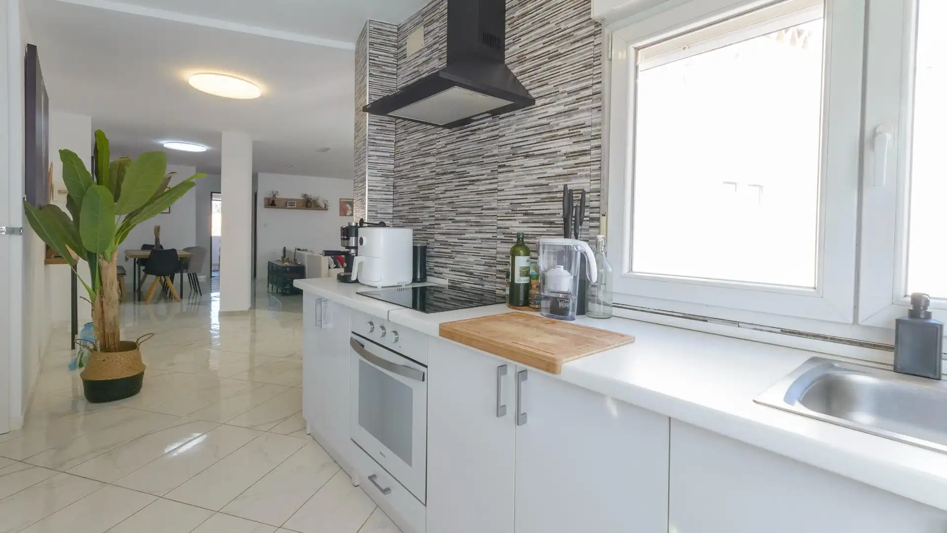Kitchen of Flat for sale in Gandia  with Air Conditioner, Terrace and Storage room