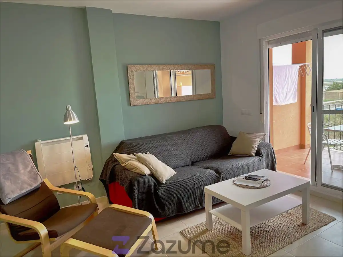 Sala de estar de Piso de alquiler en Camarles con Aire acondicionado, Piscina y Amueblado