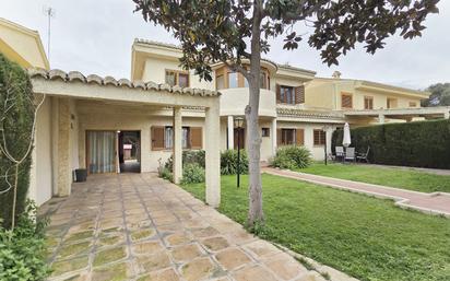 Exterior view of Single-family semi-detached for sale in La Pobla de Farnals  with Air Conditioner, Heating and Private garden