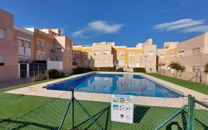 Swimming pool of Single-family semi-detached for sale in  Almería Capital  with Terrace and Community pool