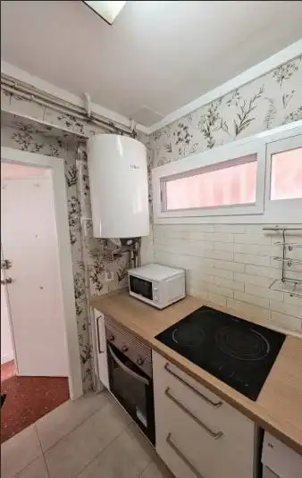 Cuina de Apartament de lloguer en La Pobla de Farnals amb Aire condicionat, Moblat i Balcó