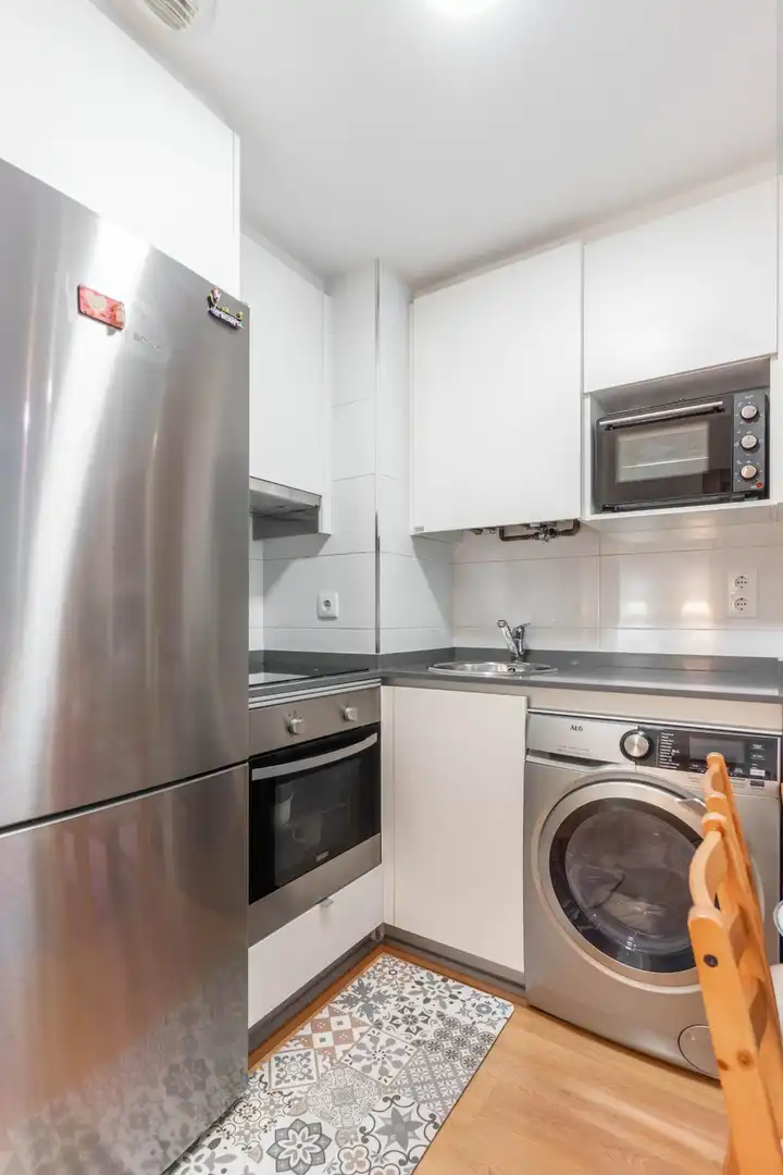 Cuina de Apartament en venda en Gijón  amb Calefacció, Traster i Moblat
