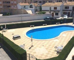 Swimming pool of Single-family semi-detached for sale in Torrevieja  with Terrace and Balcony