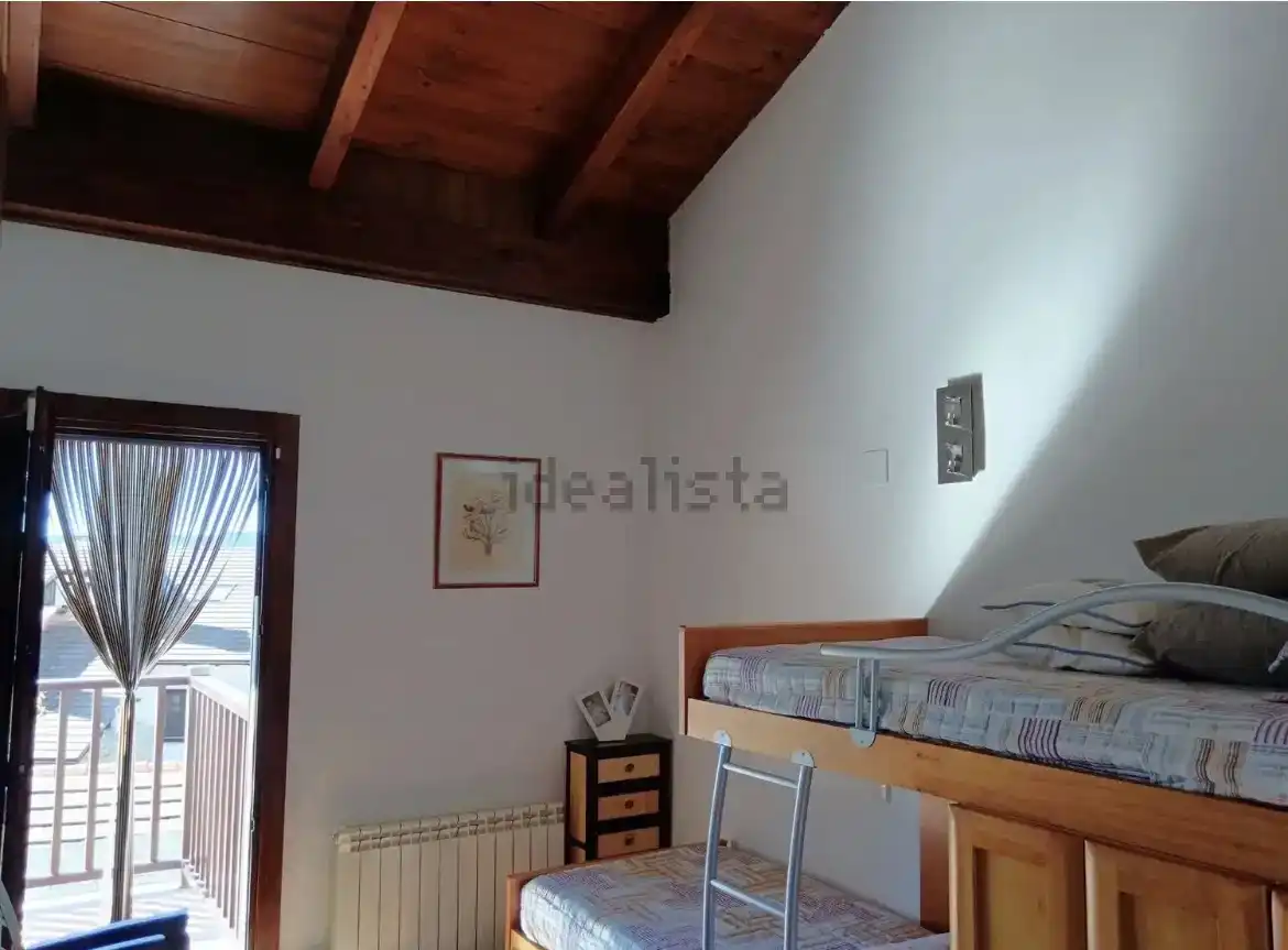 Bedroom of Duplexes for sale in Jaca  with Air Conditioner and Swimming Pool