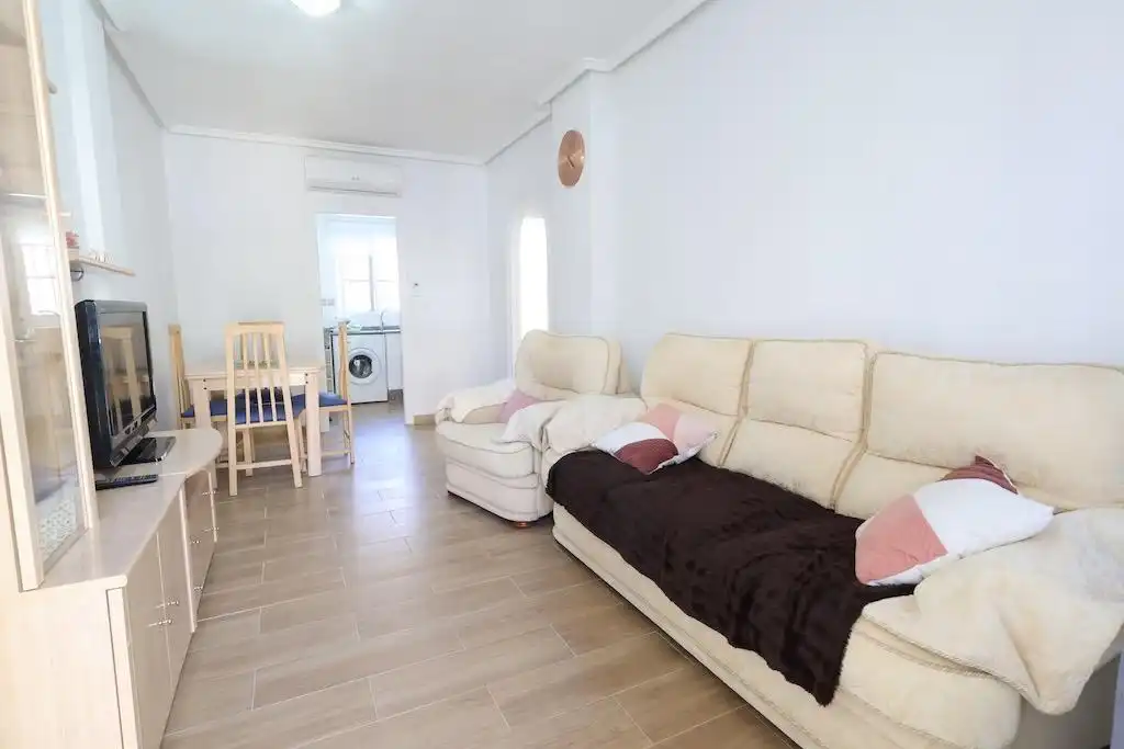 Sala d'estar de Casa o xalet en venda en Orihuela amb Aire condicionat, Jardí privat i Terrassa