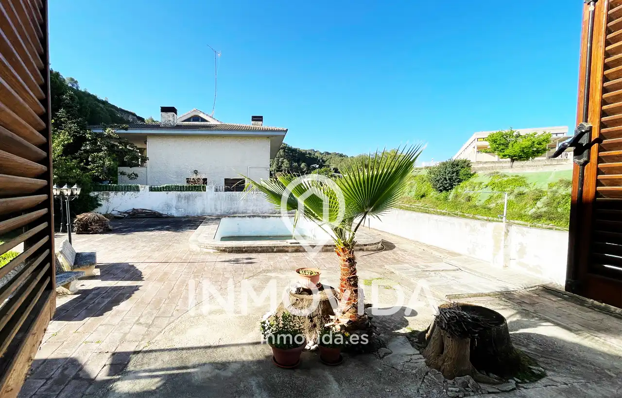 Vista exterior de Casa o xalet en venda en Mogente / Moixent amb Aire condicionat, Jardí privat i Terrassa