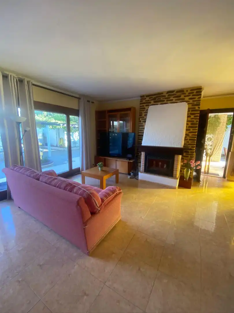 Sala d'estar de Casa o xalet en venda en Sagunto / Sagunt amb Aire condicionat, Jardí privat i Terrassa