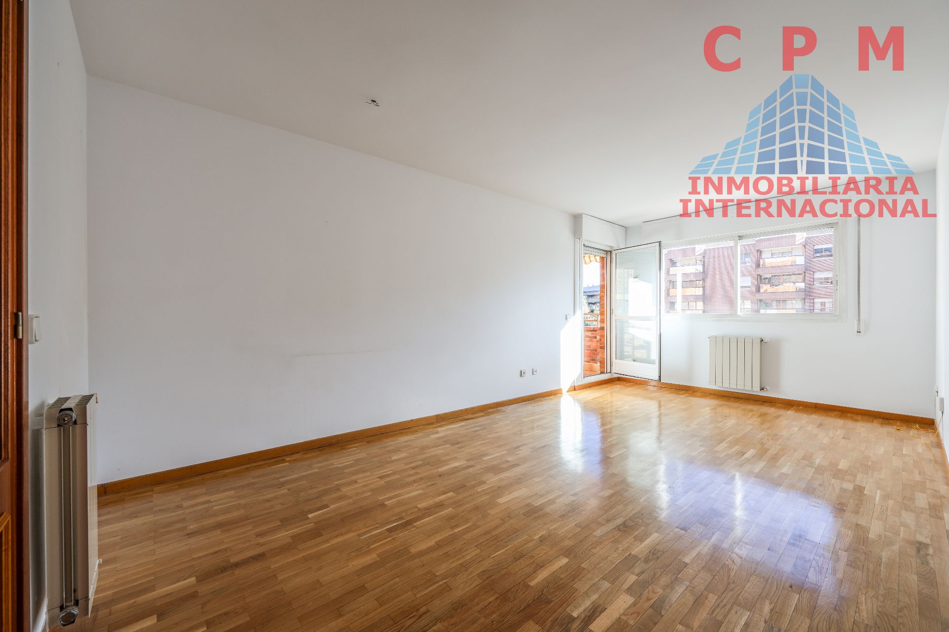 Sala d'estar de Pis de lloguer en  Madrid Capital amb Calefacció, Parquet i Terrassa