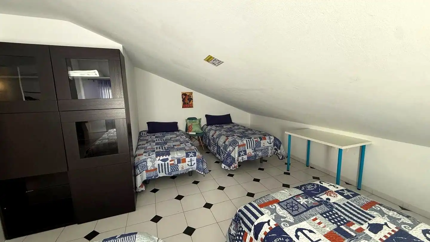 Habitación de Casa adosada en venta en Málaga con Aire acondicionado y Piscina comunitaria