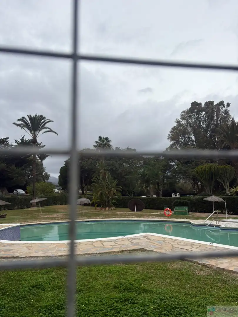 Swimming pool of Flat for sale in Estepona  with Air Conditioner, Terrace and Community pool