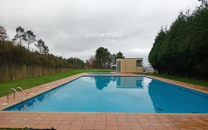 Swimming pool of Single-family semi-detached for sale in Santiago de Compostela   with Heating, Private garden and Parquet flooring