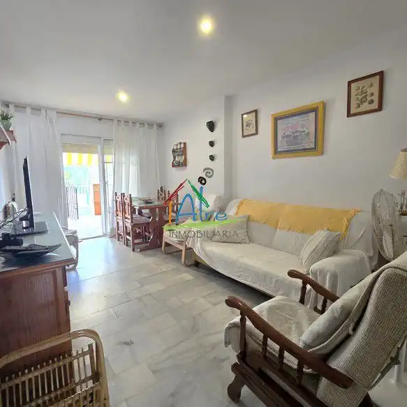 Sala de estar de Piso en venta en Almonte con Terraza y Piscina comunitaria