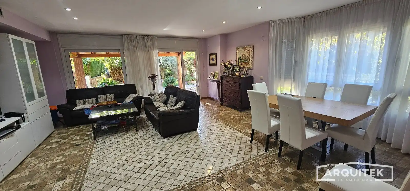 Sala de estar de Casa adosada en venta en Lleida con Aire acondicionado y Jardín privado