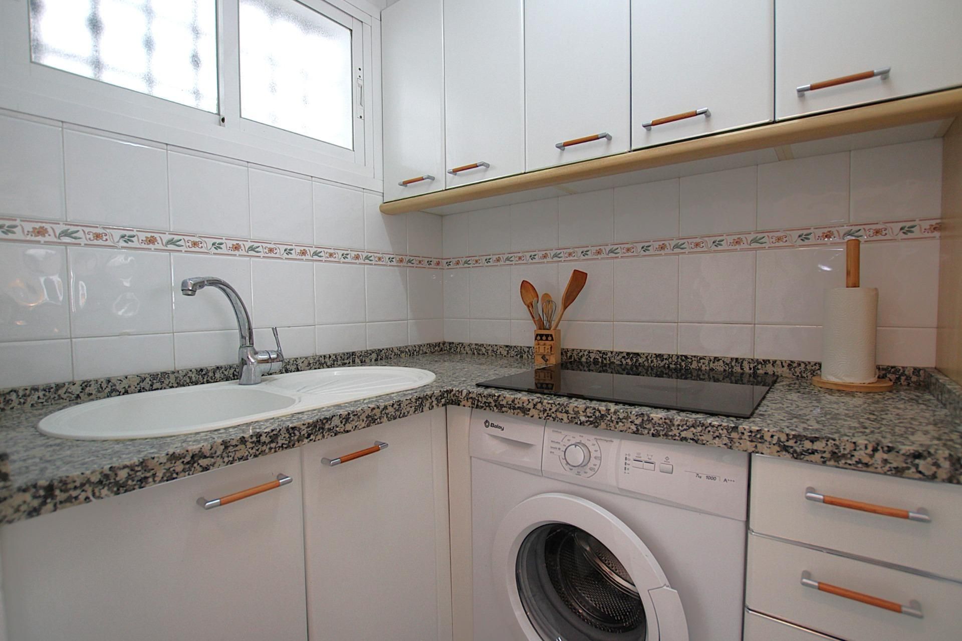 Cuina de Apartament en venda en Benalmádena amb Terrassa i Piscina comunitària