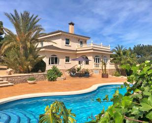 Vista exterior de Casa o xalet en venda en Mutxamel amb Aire condicionat, Jardí privat i Terrassa