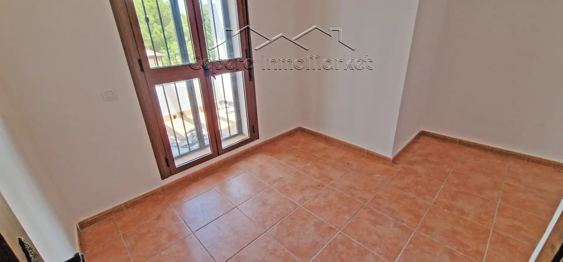 Terrasse von Einfamilien-Reihenhaus zum Verkauf in El Puerto de Santa María mit Privatgarten und Balkon