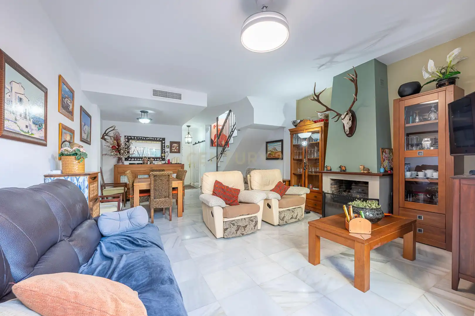 Sala de estar de Casa adosada en venta en Estepona con Aire acondicionado, Trastero y Piscina comunitaria