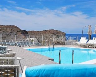 Swimming pool of Building for sale in Mogán