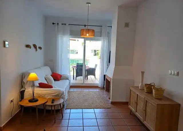 Sala de estar de Apartamento de alquiler en Islantilla con Aire acondicionado, Calefacción y Terraza