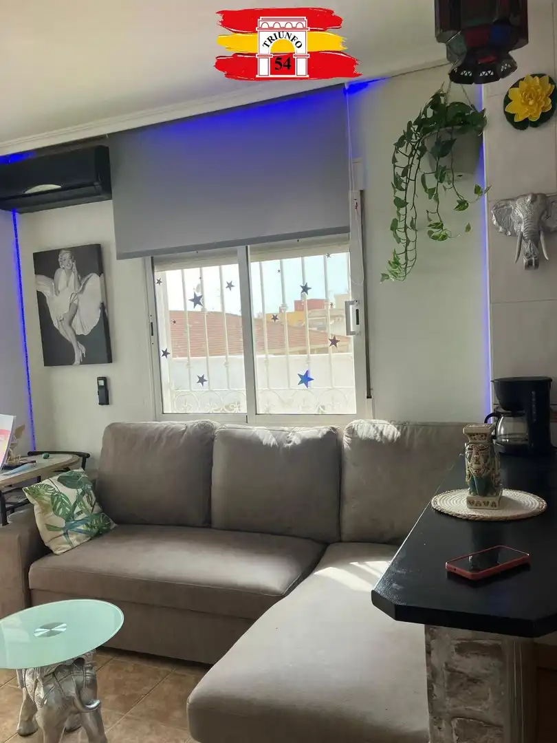 Sala d'estar de Àtic en venda en Pilar de la Horadada amb Aire condicionat, Terrassa i Moblat