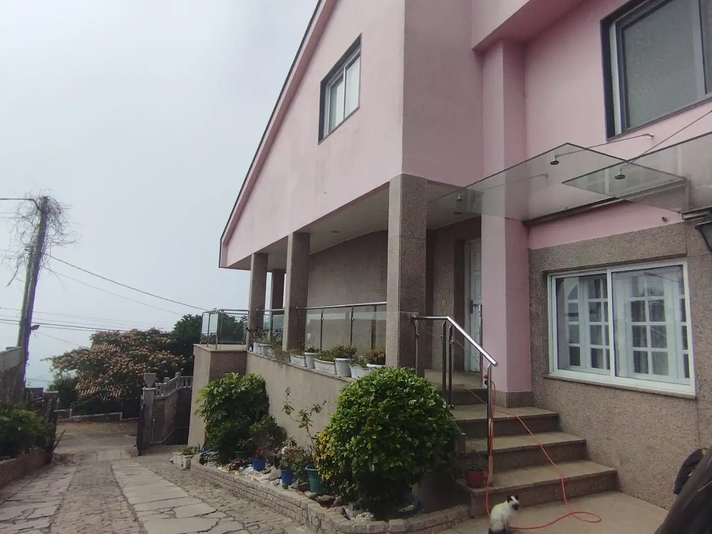 Vista exterior de Casa o xalet en venda en Nigrán amb Calefacció, Jardí privat i Piscina