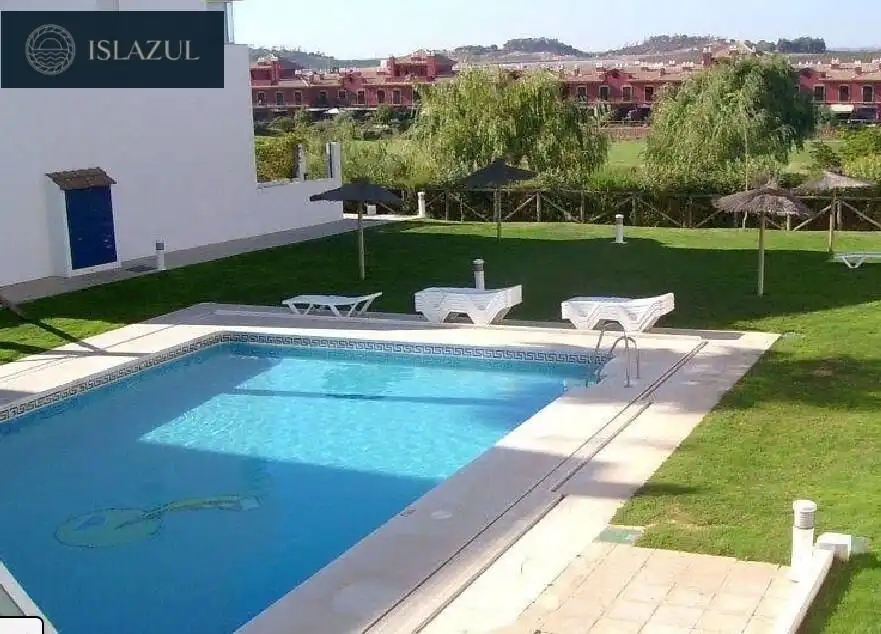 Piscina de Dúplex en venta en Islantilla con Aire acondicionado, Calefacción y Jardín privado