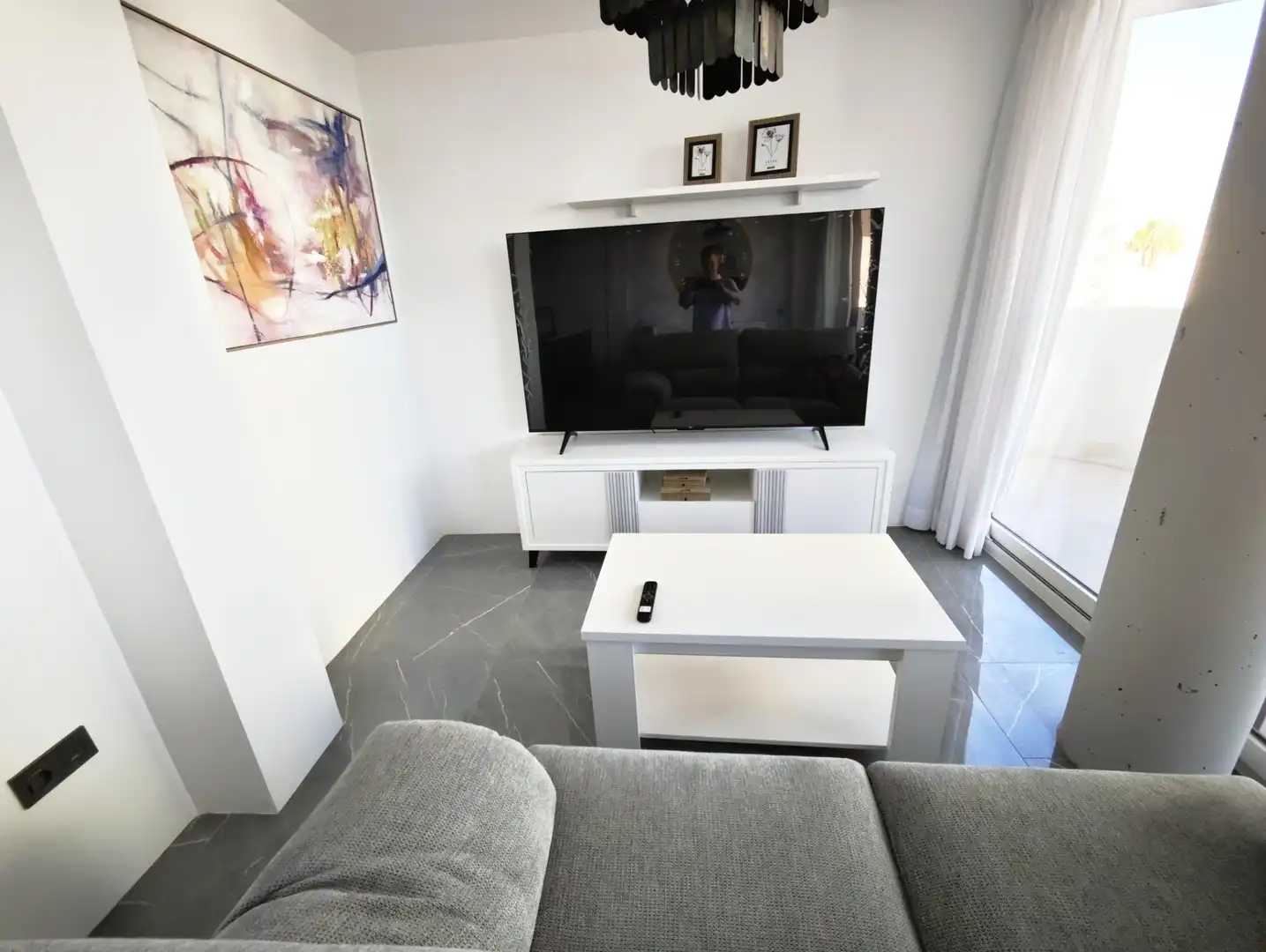 Sala d'estar de Apartament en venda en Benalmádena amb Aire condicionat, Terrassa i Traster