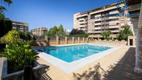 Swimming pool of Apartment for sale in  Granada Capital  with Air Conditioner, Heating and Private garden
