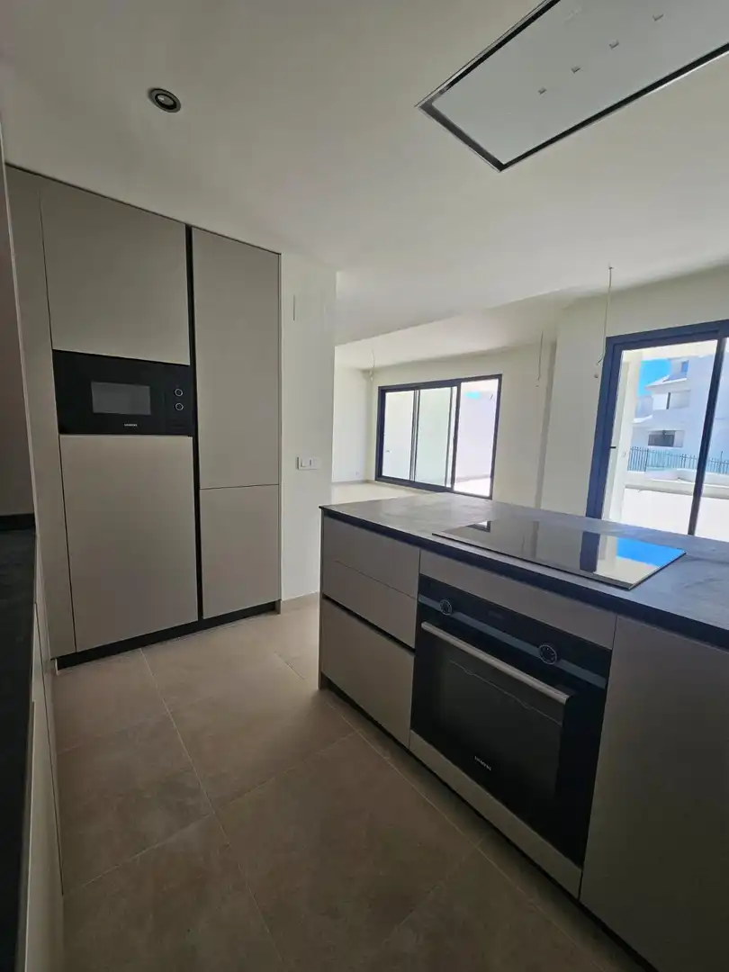 Cuina de Casa adosada en venda en Benalmádena amb Aire condicionat, Jardí privat i Terrassa