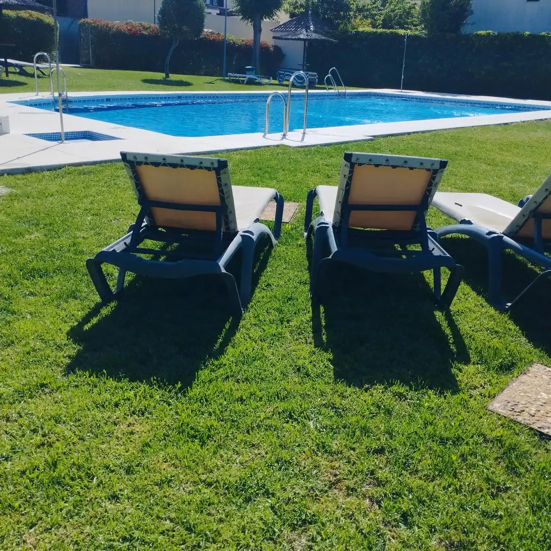 Piscina de Casa adosada en venta en Valencina de la Concepción con Aire acondicionado, Trastero y Piscina comunitaria