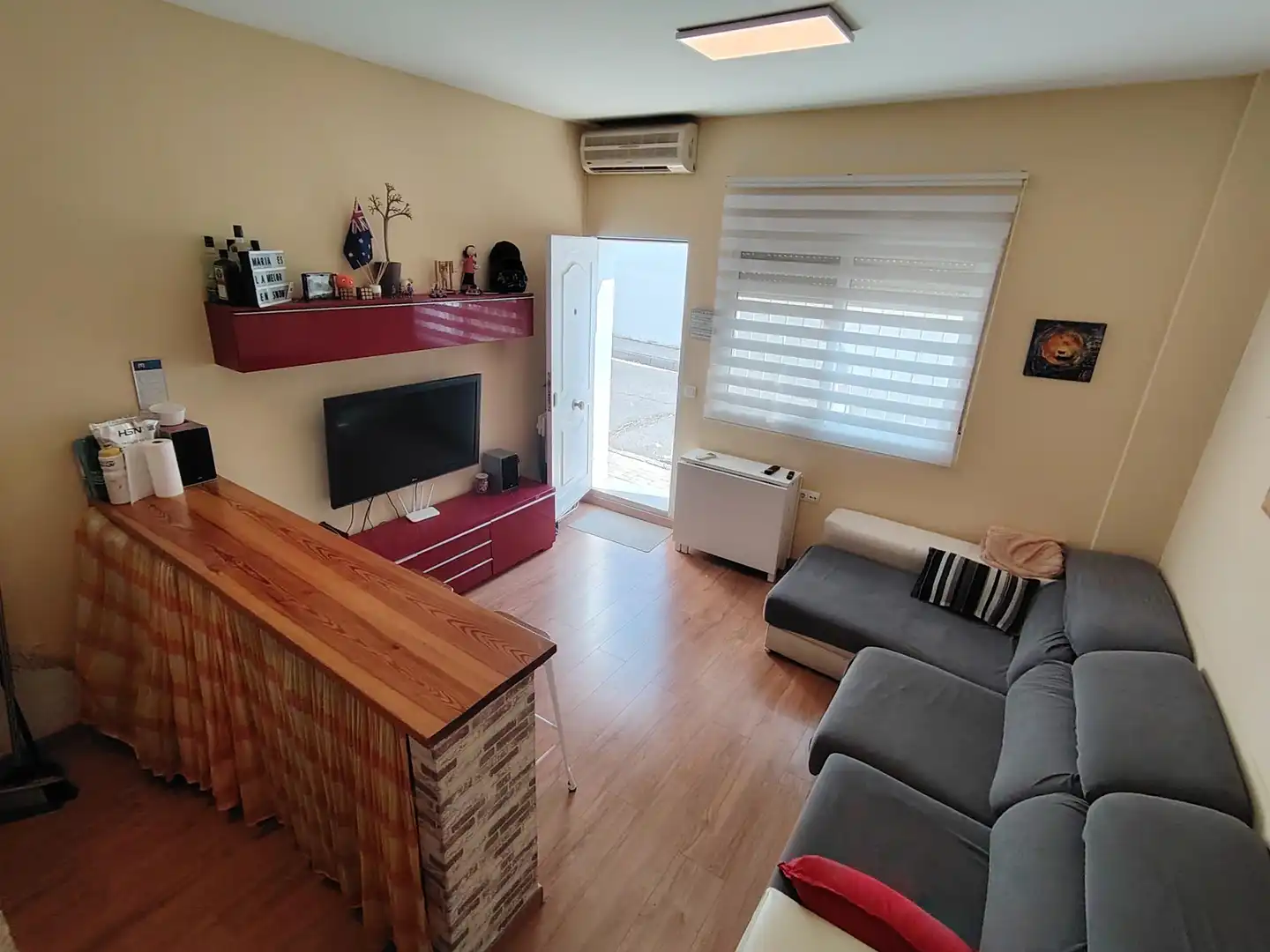 Sala de estar de Casa adosada en venta en Málaga con Aire acondicionado, Jardín privado y Trastero