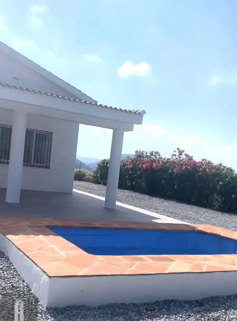 Vista exterior de Finca rústica en venda en El Borge amb Jardí privat, Terrassa i Traster