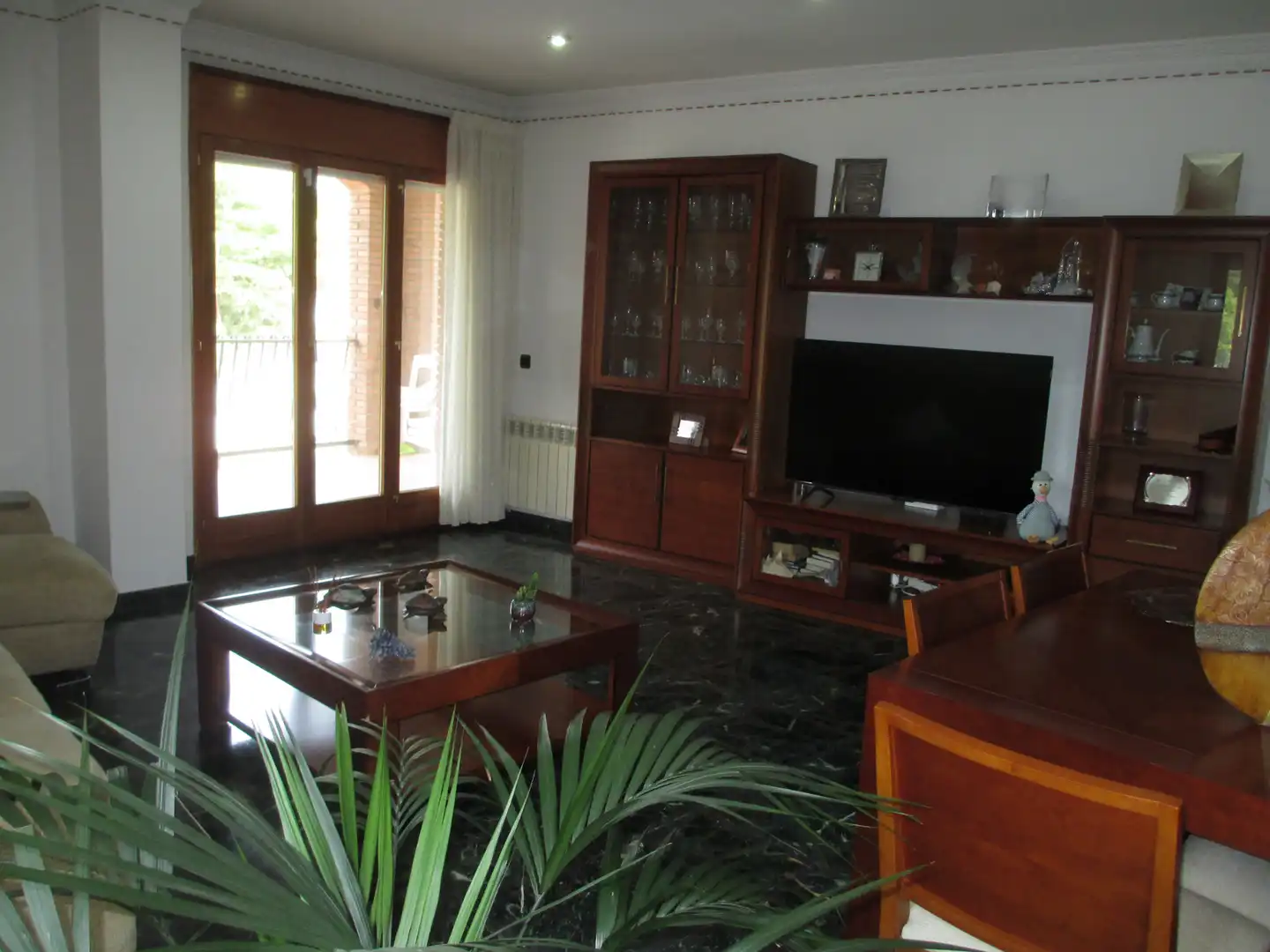 Sala d'estar de Casa adosada en venda en Sant Celoni amb Calefacció, Terrassa i Traster
