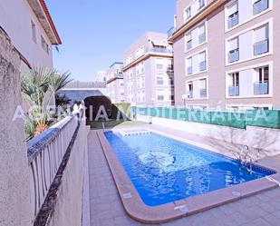 Swimming pool of Flat for sale in Pedreguer  with Air Conditioner, Heating and Private garden