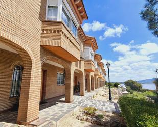 Vista exterior de Casa adosada en venda en Manzanares El Real amb Terrassa