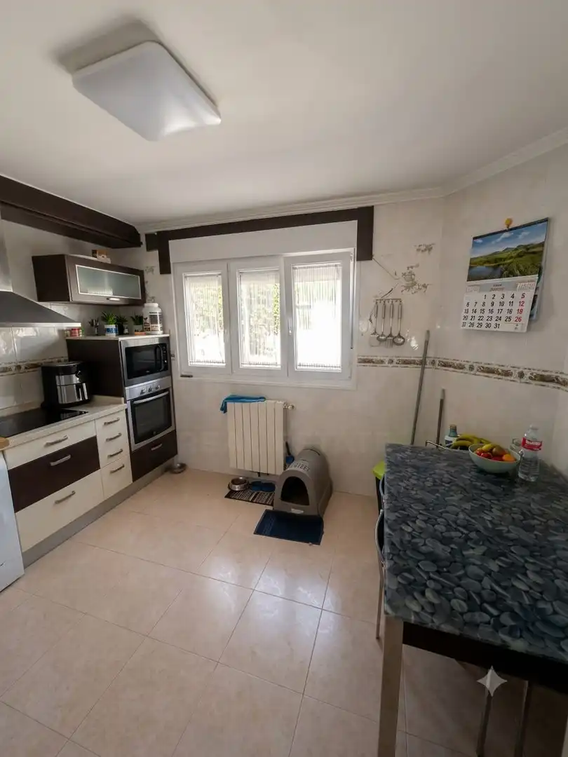 Cuina de Casa adosada en venda en San Andrés del Rabanedo amb Calefacció i Terrassa